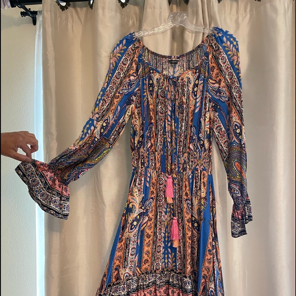 This is a Kas New York dress.High low dress with long sleeve, multi color.